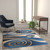 Coterie Collection 5' x 7' Modern Circular Patterned Indoor Area Rug - Blue and Beige Olefin Fibers with Jute Backing - view-1