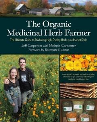 Front cover of The Organic Medicinal Herb Farmer dark green cover with white letters and a couple standing in a field of flowers.