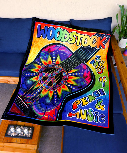 Plush flannel fleece throw blanket with licensed Woodstock design.