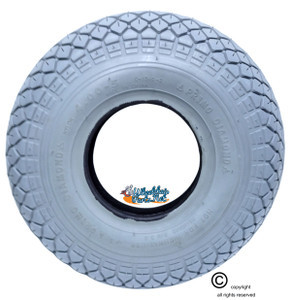 13 X 4" Grey Non-Marking (330X100) Knobby Tire. SOLD AS PAIR