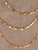 The Paloma Layers necklace features four luminous chains -  16", 18",20", and 22" - joined together in perfect harmony to create a layered look without the fuss.