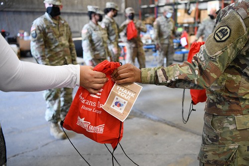 Thank you package given to military hero in support of those who serve.