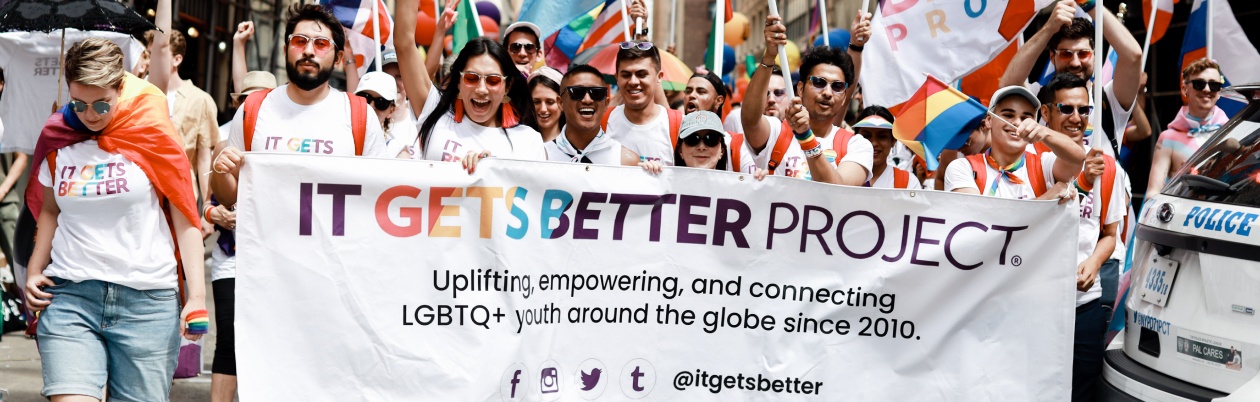 A group of advocates for the It Gets Better project proudly supporting the cause that empowers youth in the LGBTQ+ community.