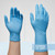 Comparison of a standard blue nitrile glove versus a DuraSkin 12-inch extended cuff glove on a forearm, highlighting the extra 8 mil thickness and protective coverage.