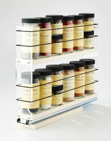 I made a pull-out spice rack to organize all our spice jars