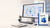 Microsoft Visio Professional 2024 displayed beside a workstation showing professional flowcharts and data visualisations
