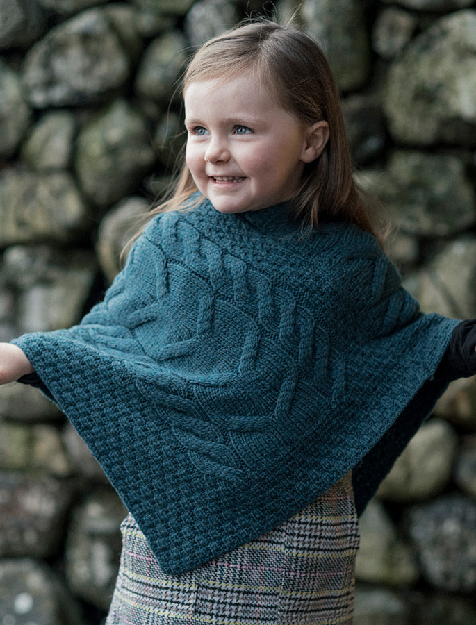 This cable poncho knitting pattern is so easy to make – Through