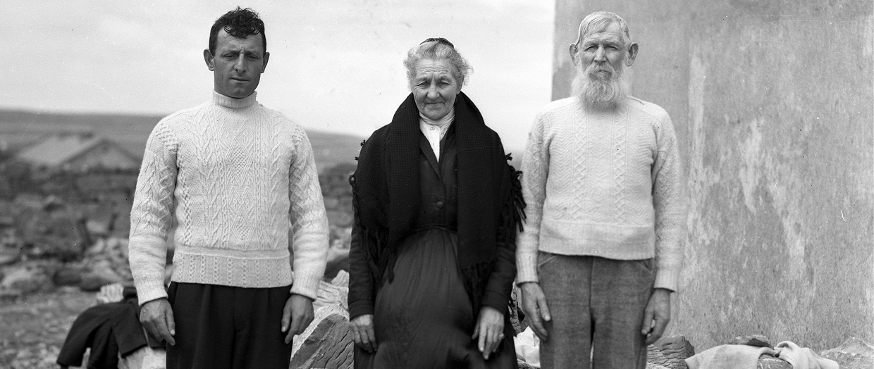 Aran islanders in traditional dress, the men wearing hand-knit Aran sweaters