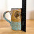 Handmade Pottery Mug Southwest Collection Teal and Tan with Bear Image