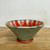  Handmade Pottery Serving Bowl with Soft Green Outside and Orange/Red Flower Inside. Hand Carved One of a Kind!