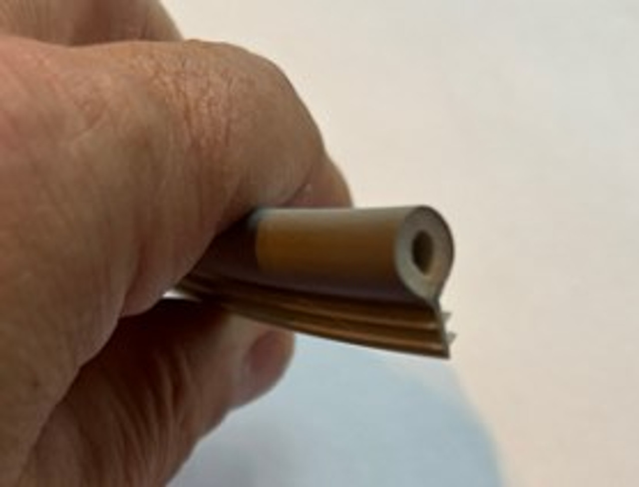 Hurd compression tilt double hung DH weather strip. comes as 24 ft roll for top and bottom rails of sash.