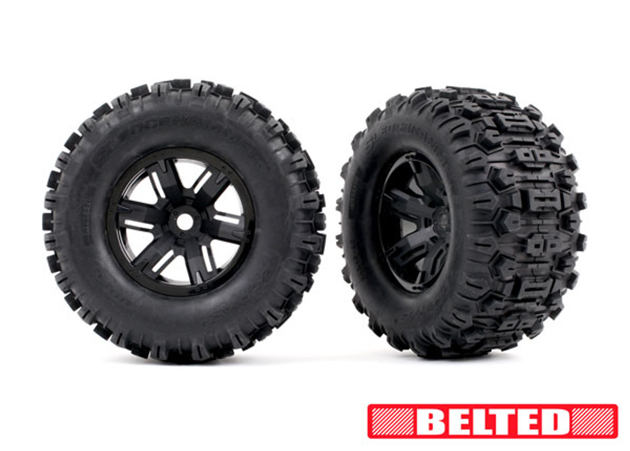 Traxxas 7871 Tires & wheels, assembled, glued (X-Maxx black wheels, Sledgehammer belted tires, dual profile (4.3" outer, 5.7" inner), foam inserts) (left & right)