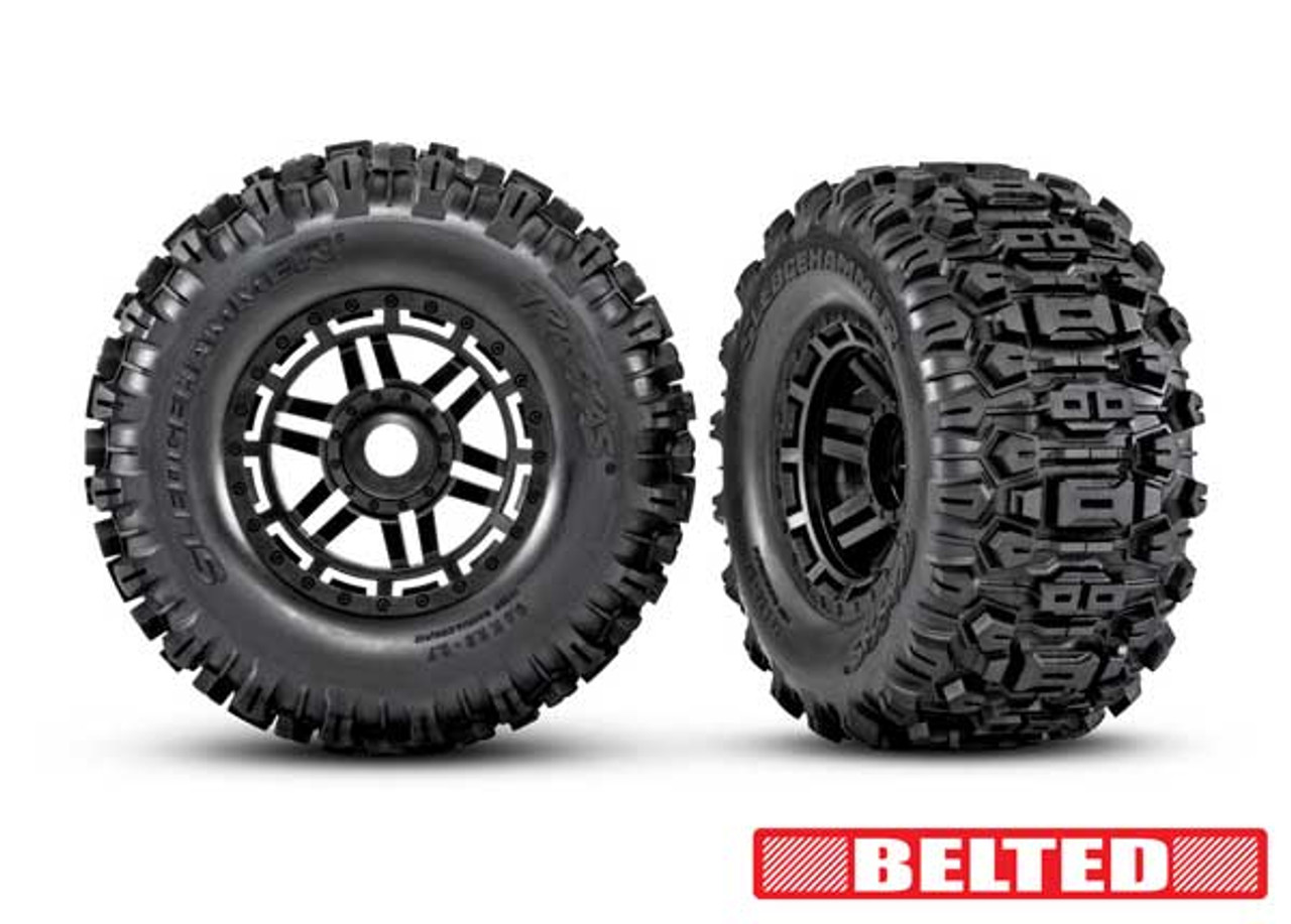 Traxxas 8979 Tires & wheels, assembled, glued (black wheels, belted Sledgehammer All-Terrain tires, dual profile (2.9" outer, 3.8" inner), foam inserts) (2) (17mm splined) (TSM rated)