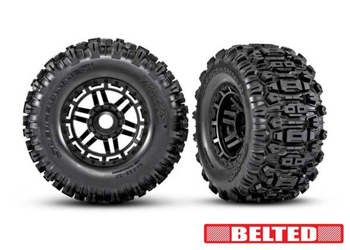 Traxxas 8979 Tires & wheels, assembled, glued (black wheels, belted Sledgehammer All-Terrain tires, dual profile (2.9" outer, 3.8" inner), foam inserts) (2) (17mm splined) (TSM rated)