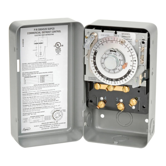 Time-initiated, time-terminated defrost control with steel case