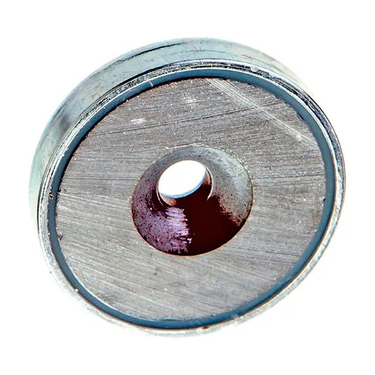 Shielded disc retaining magnet with countersunk through hole