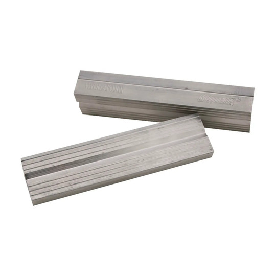 Aluminum magnetic vise jaw caps with grooved clamping surface