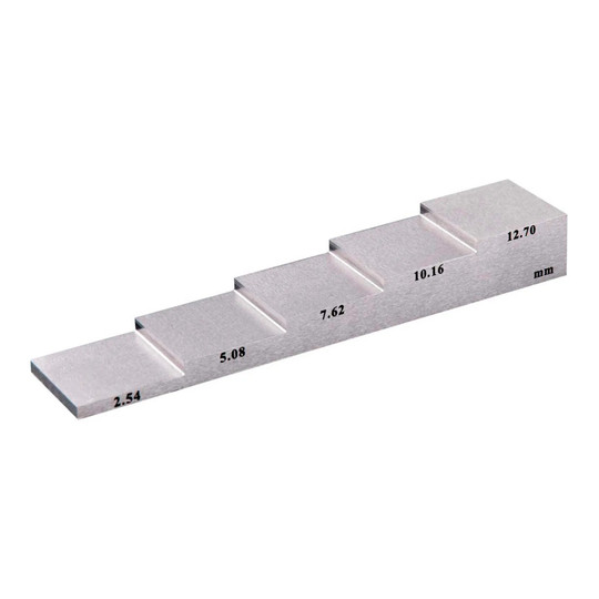 Steel five-step calibration block with imperial and metric markings