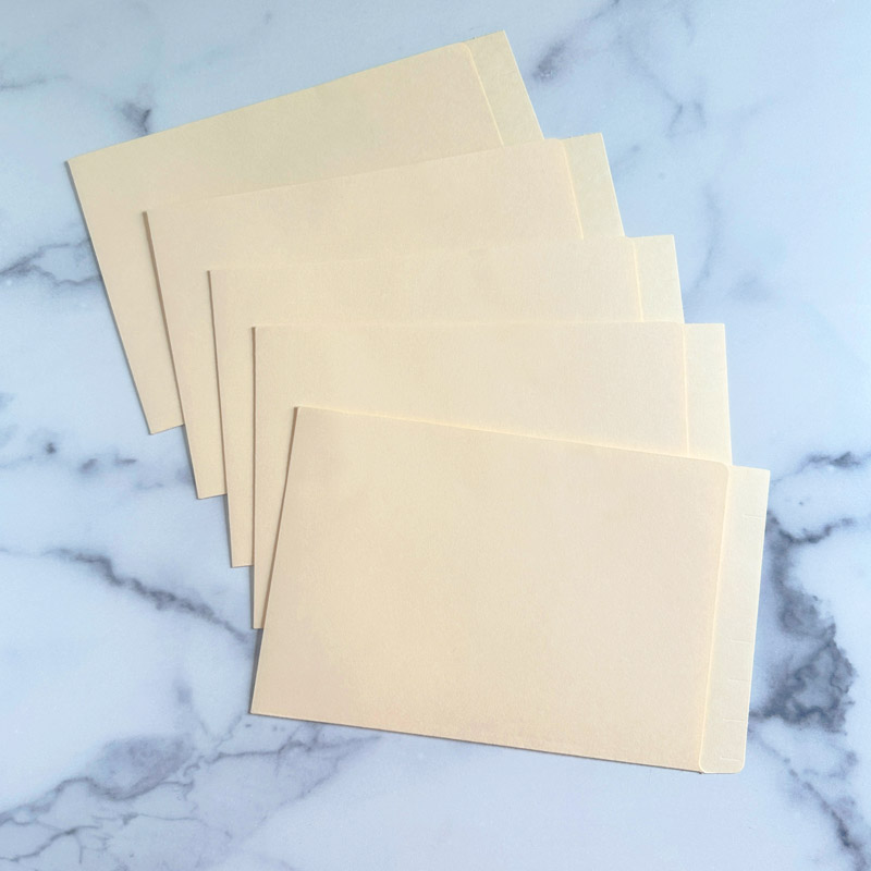 MJP11 Mini Half Pocket End Tab File Folder - 11 Pt. Manila - 6" H X 9 1/2" W - 100/Box at FilingSupplies.com