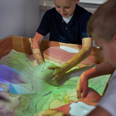 Interactive Augmented Reality Sandbox for STEM Learning