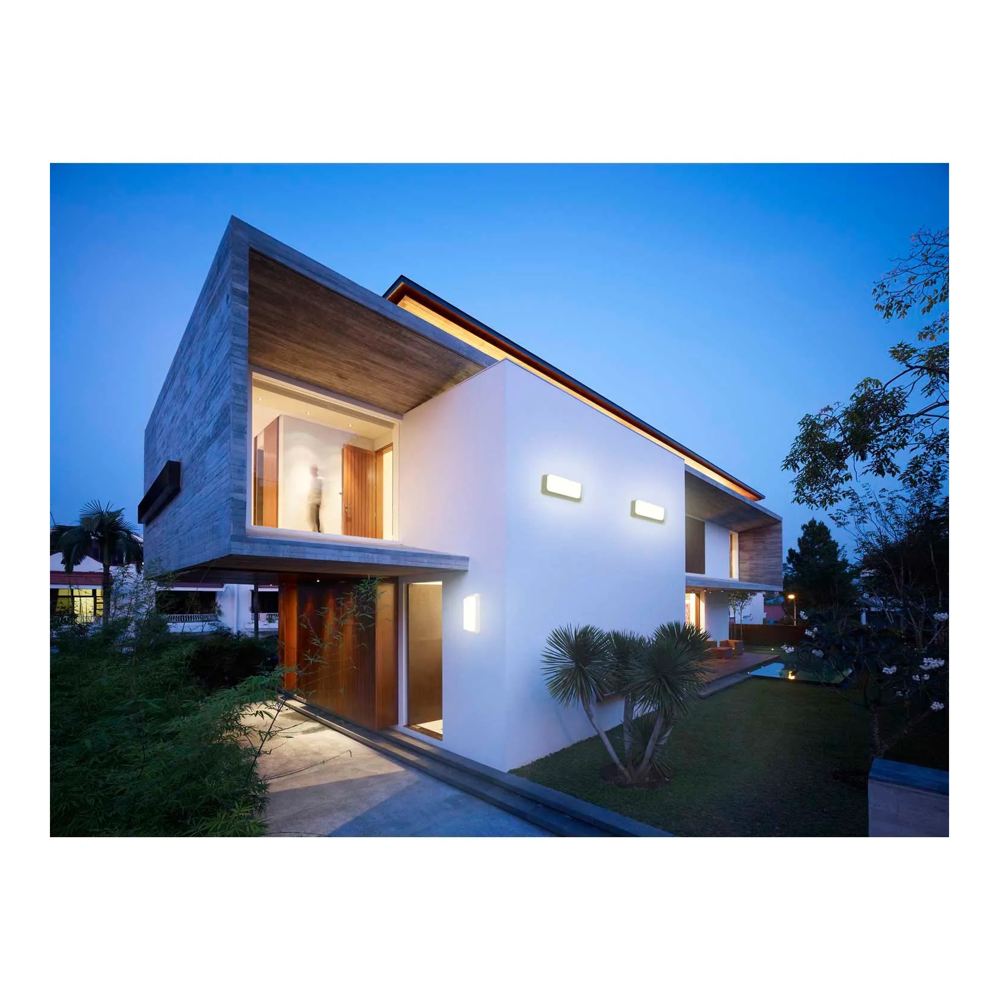 Black 12W motion-sensing LED ceiling and wall light with 5000K illumination