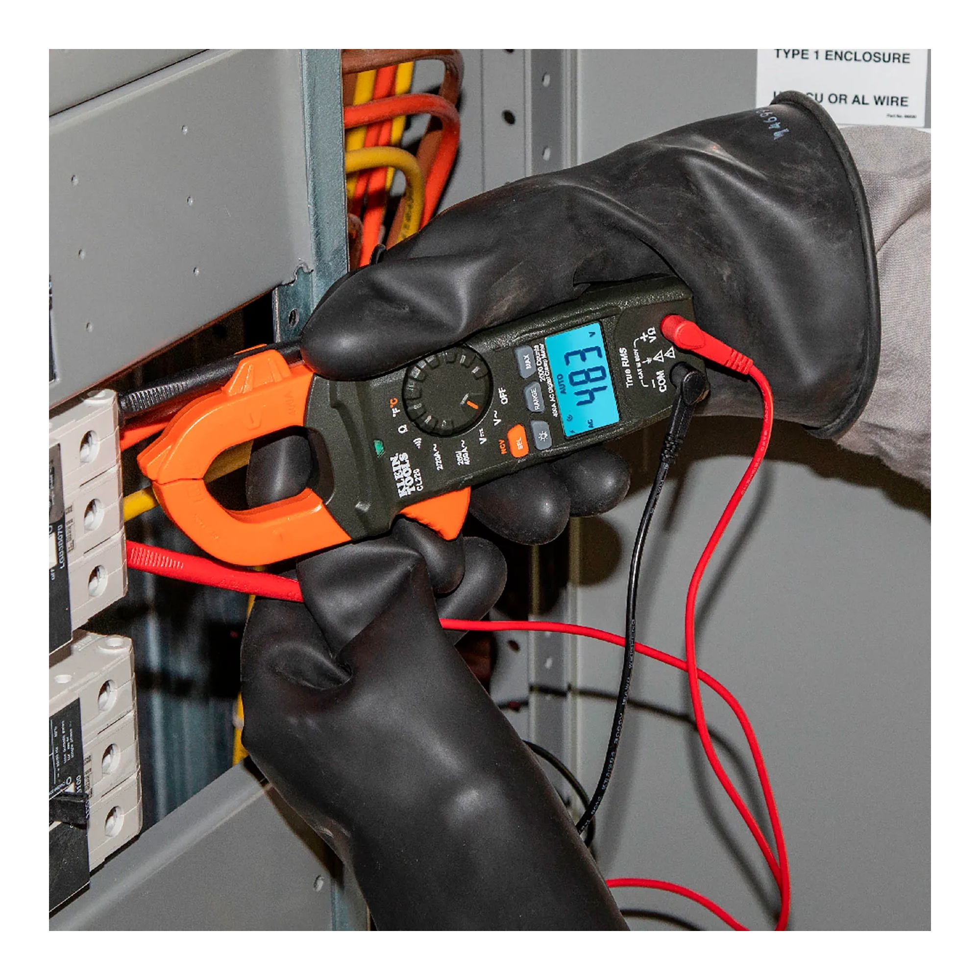Digital clamp meter with clamp jaw and backlit display