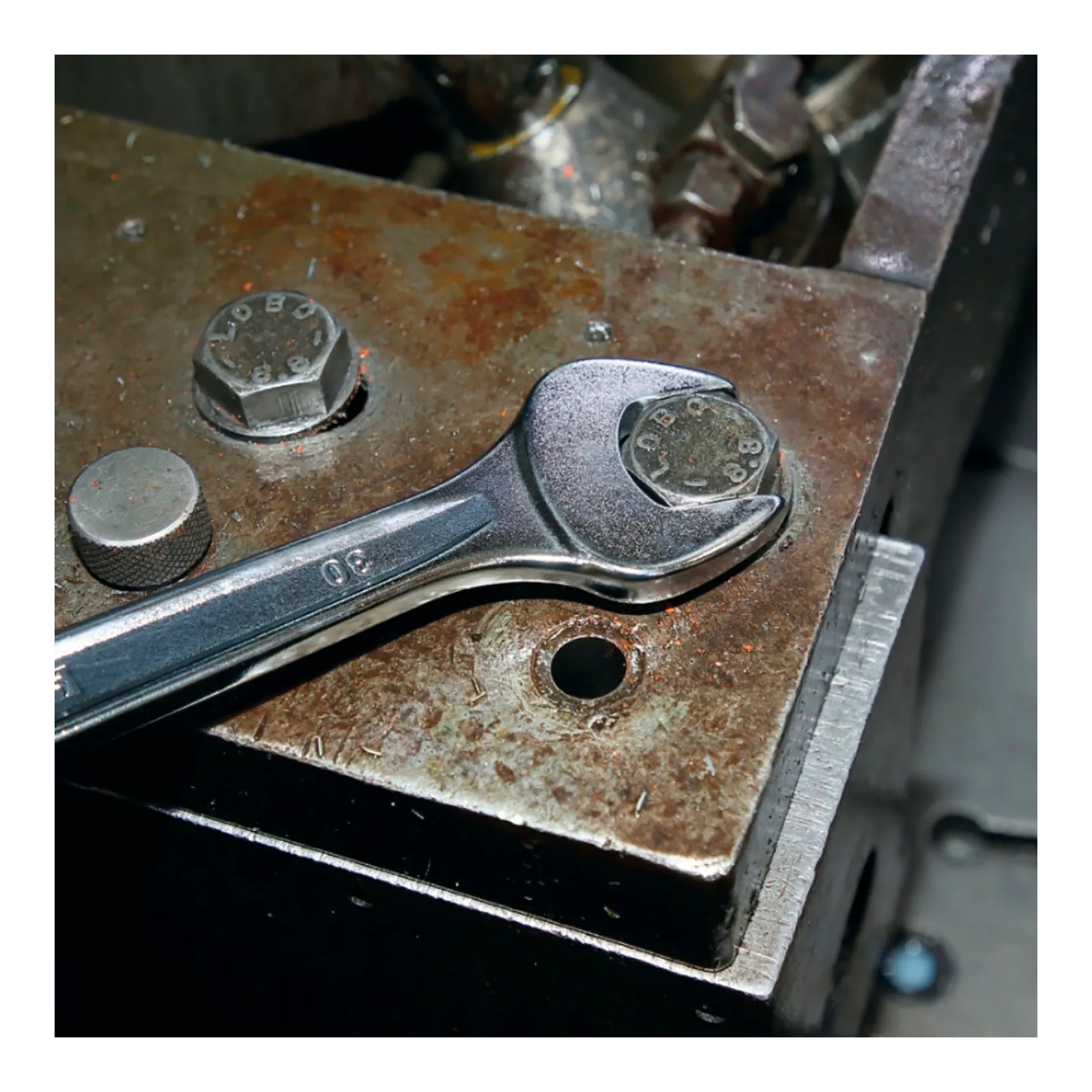 Silver 12 mm 12-point 15° offset combination wrench