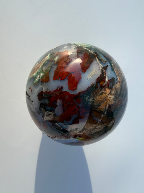 Indonesian coral agate sphere