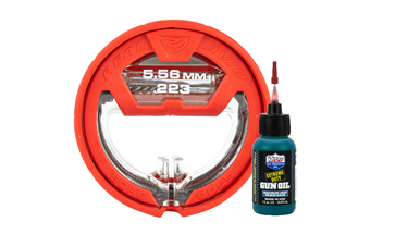 Real Avid Bore Boss .223 5.56 bore cleaner packaged with a 1oz bottle of Lucas Extreme Duty Gun Oil