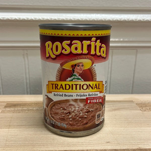 <p data-mce-fragment="1"><strong>Rosarita Traditional Refried Beans</strong> offer a delicious and convenient way to enjoy the classic taste of refried beans. Made from high-quality pinto beans, these refried beans are expertly seasoned and mashed to perfection, creating a creamy and flavorful base that's perfect for a variety of Mexican and Tex-Mex dishes.</p>
<p data-mce-fragment="1">The traditional recipe captures the authentic essence of refried beans, making them a versatile pantry staple. Whether used as a savory side dish, a filling for tacos and burritos, or a layer in nachos, Rosarita Traditional Refried Beans add a rich and satisfying element to your favorite meals. The convenience of canned refried beans also makes them a time-saving solution for busy kitchens, allowing you to enjoy the authentic taste of homemade refried beans without the extra effort. With Rosarita, savoring the comforting and savory goodness of traditional refried beans is just a can away.</p>