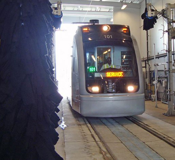 Train going through automated wash system