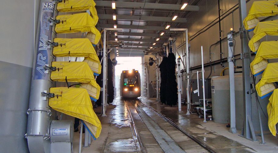 Train going through a train wash system.