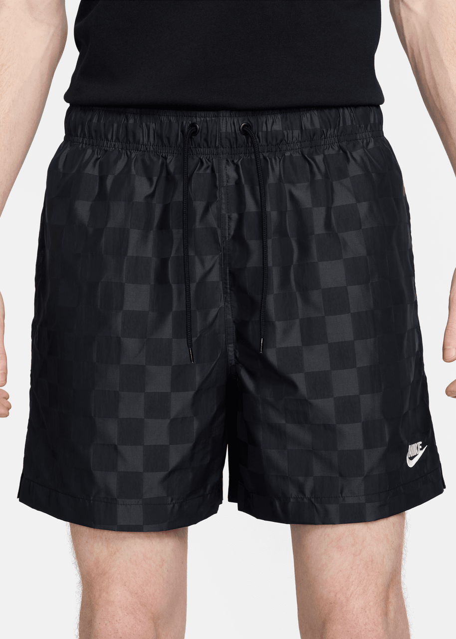 black nike shorts with white check