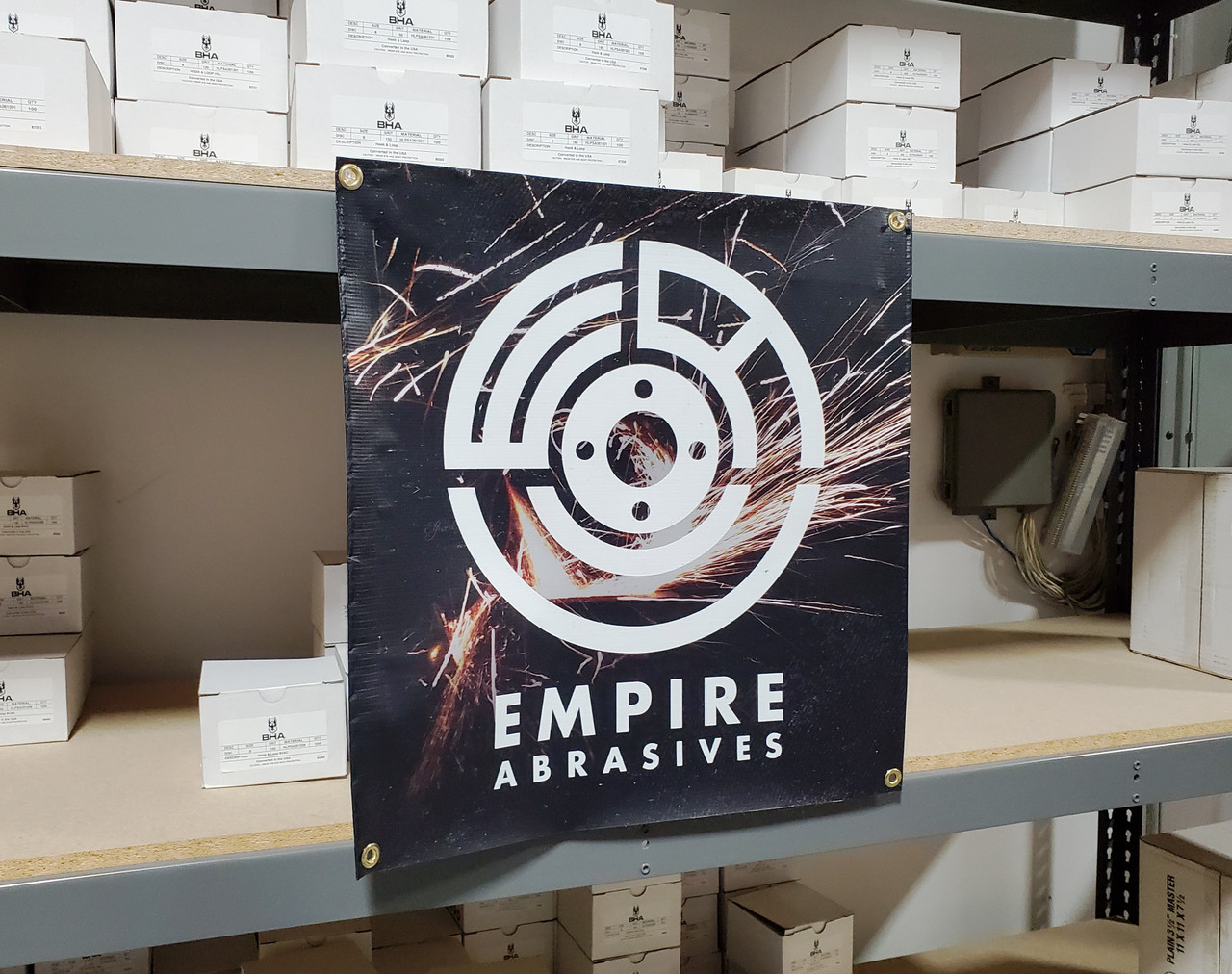 Empire Abrasives Sparks 2' x 2' Shop Banner