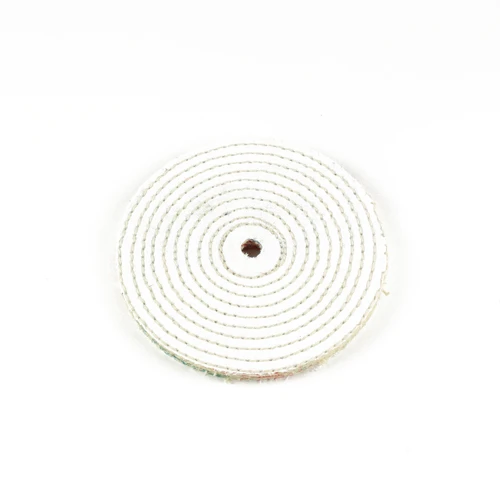 Top view of 6-inch spiral sewn sisal buffing wheel showing coarse fiber texture, 1/4-inch stitch spacing, and 1/2-inch arbor hole