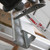 Morse PRO 12-inch 14 TPI reciprocating saw blade lined up to cut a thick metal beam