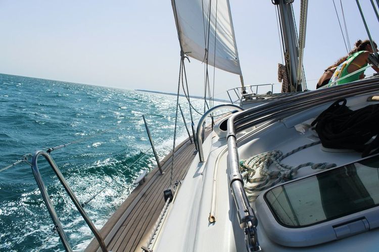 a sailboat sailing through the water