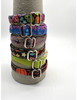 Images shows Purrfectplay's organic  cotton collars displayed vertically on top of each other for comparison.  Washable Cotton Cat Collars.  Comfortable hypoallergenic collars with break away buckles. Made in the USA