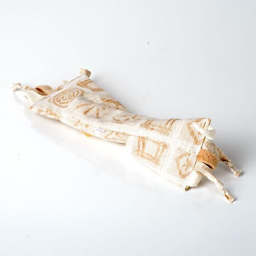Image shows a long cotton catnip free bunny kick cat toy. It is brown and white with fringe on each end.  It is 10 inches long and 3 inches wide.  Plastic and dye free natural cat toy.  