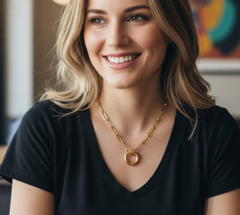 The Keepsake Charm Holder Necklace. What a ripper! This 18K gold-plated stainless steel paperclip chain necklace with a unique charm holder is an absolute stunner. Looks unreal on the model and it’s perfect for holding all your favourite charms.