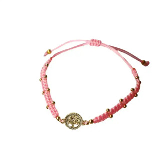 A really cute bracelet with a braided pink cord. The circular Tree of Life charm, with its sparkling little crystals, has an 18K gold-plated finish.