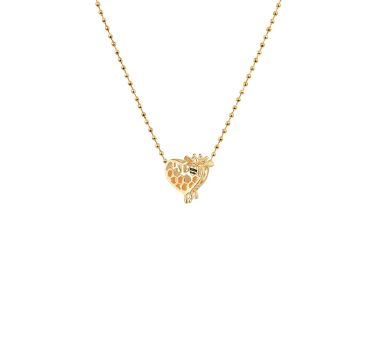 A close-up of the Beeloved Necklace showing every detail of the pendant and its small bee. Set in a white background.