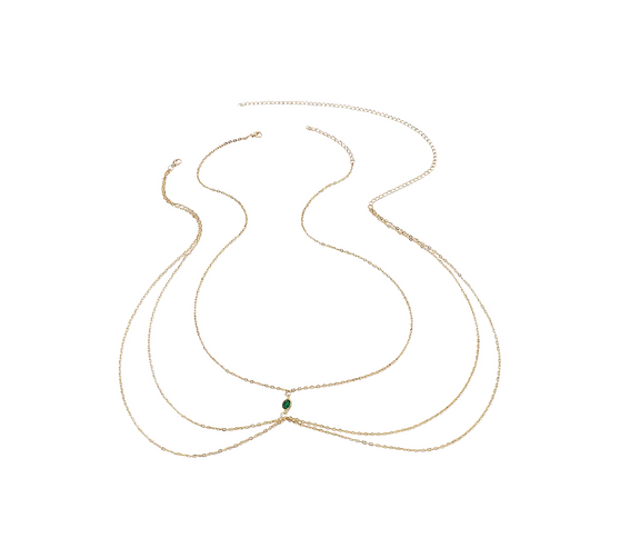 Close-up of the Keira K Jewellery Emerald Kiss Body Chain, showing the gold-plated chain and emerald zircon detail.
