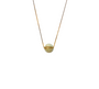 Shot of the Fire Rings Necklace on a white background, showing the round yellowish jade gemstone wrapped by two golden chains made of 18k gold-filled sterling silver.