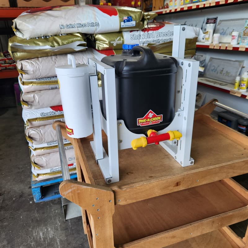 Dine-A-Chook customer photo: Made right here in North Queensland. Drumstand with additional feeder and drinker mount as