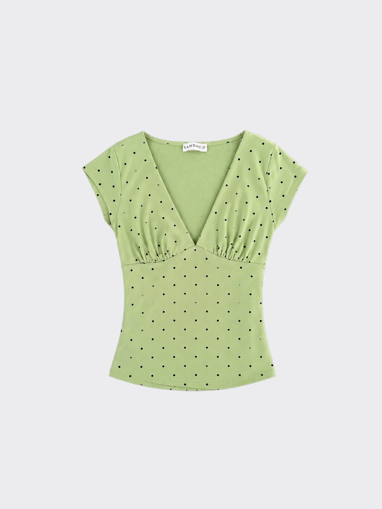 Green polka dot V-neck ruched top