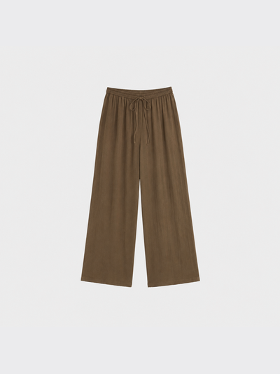 Flowy linen trousers with pleated effect