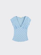 Blue polka dot V-neck ruched top