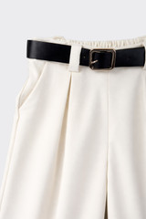 Maxi trousers with plates and belt beige