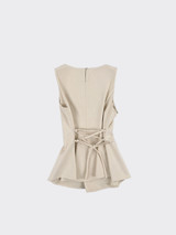 Taupe peplum top fitted at the back